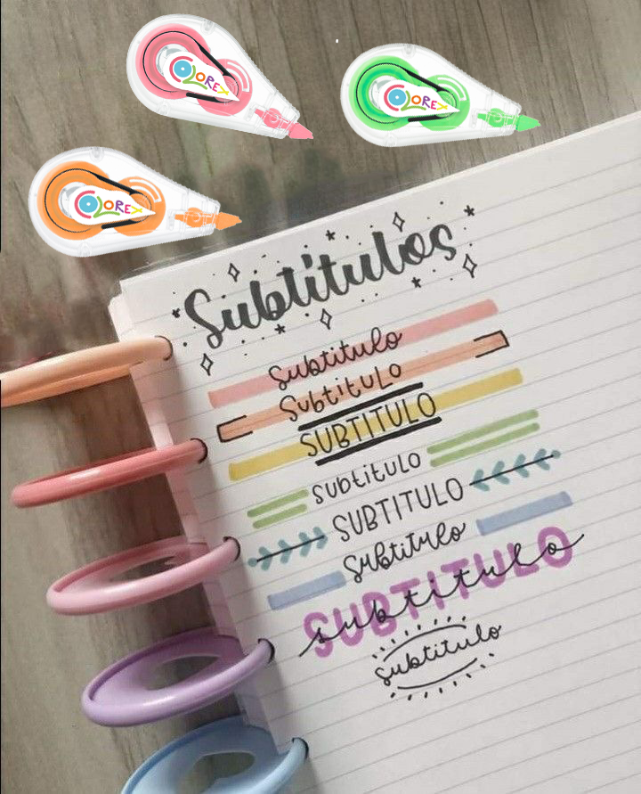 Libreta con subtítulos decorados con correctores en cinta Color-ex naranja, rosa y verde.